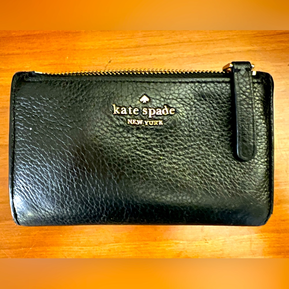Kate Spade Wallet gently used; snap works perfectly; no rips or stains!